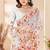 White color net resham embroidered & zircon work saree