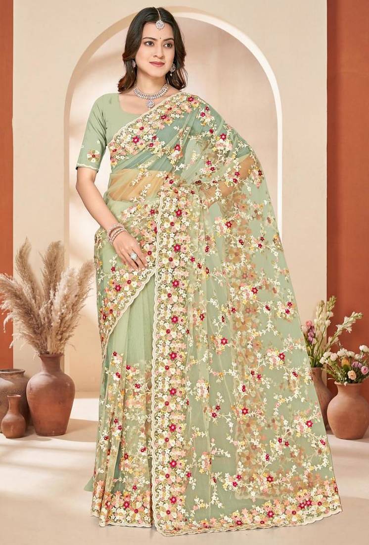 Dusty pista color net resham embroidered & zircon work saree