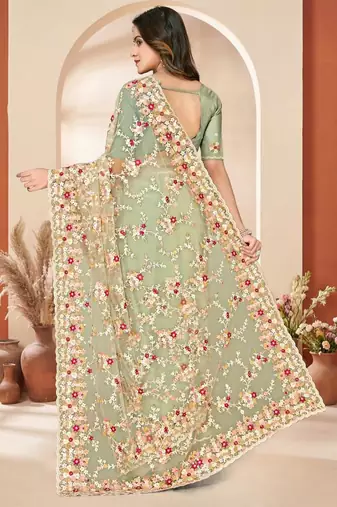 Dusty pista color net resham embroidered & zircon work saree