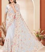 White color net resham embroidered & zircon work saree