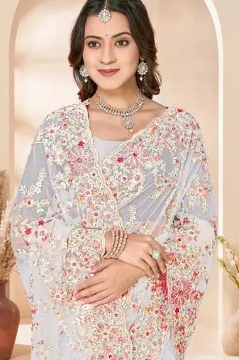 White color net resham embroidered & zircon work saree