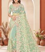 C green color net resham embroidered & zircon work saree