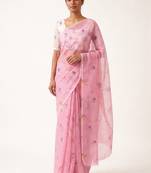 pink linen saree with woven checks floral print