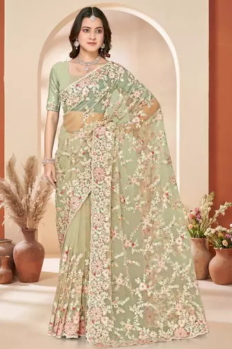 Dusty pista color net resham embroidered & zircon work saree