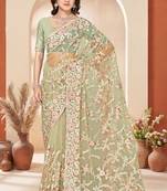 Dusty pista color net resham embroidered & zircon work saree