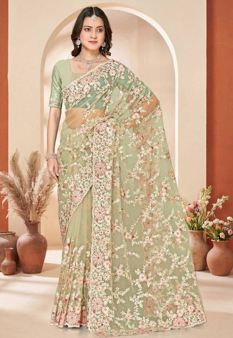 Dusty pista color net resham embroidered & zircon work saree