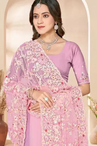 Dusty pink color net resham embroidered & zircon work saree