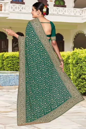 Rama color georgette zari embroidered & zircon work saree