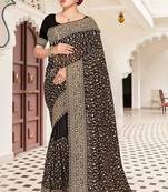Black color georgette zari embroidered & zircon work saree