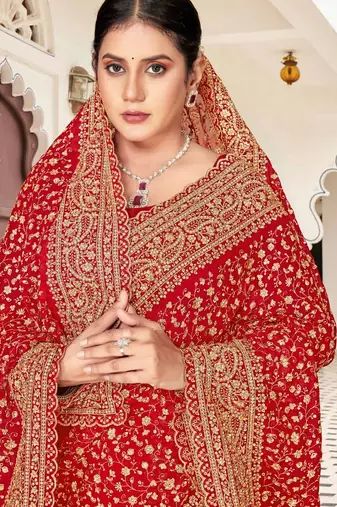 Red color georgette zari embroidered & zircon work saree
