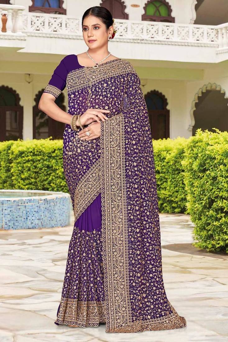 Purple color georgette zari embroidered & zircon work saree