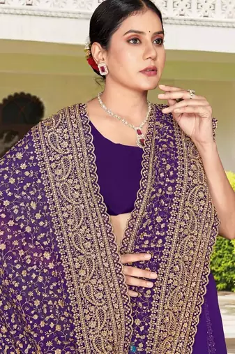 Purple color georgette zari embroidered & zircon work saree