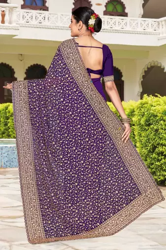 Purple color georgette zari embroidered & zircon work saree