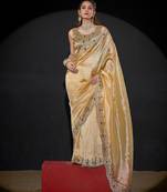 Dusty yellow color kanjivaram pure silk blend zircon border saree