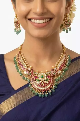 Morvaara Emerald Kundan Bridal Set | 18K Gold Plated Red, White & Green Stone Statement Jewellery