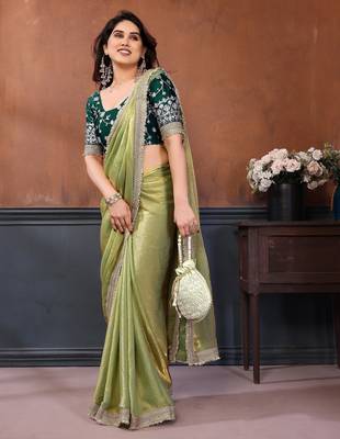 light green party wear satin saree with lace border 3