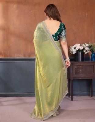 light green party wear satin saree with lace border 4