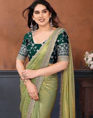 light green party wear satin saree with lace border 5