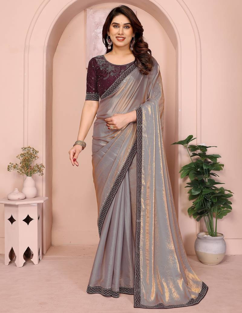 Gold fandy satin saree with sequence lace border and contrast blouse piece