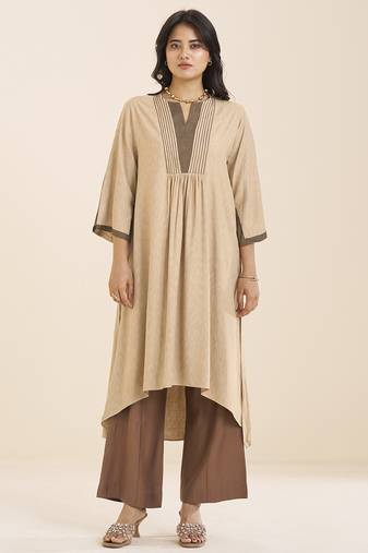 women’s beige viscose blend v neck kurta with front pleat design