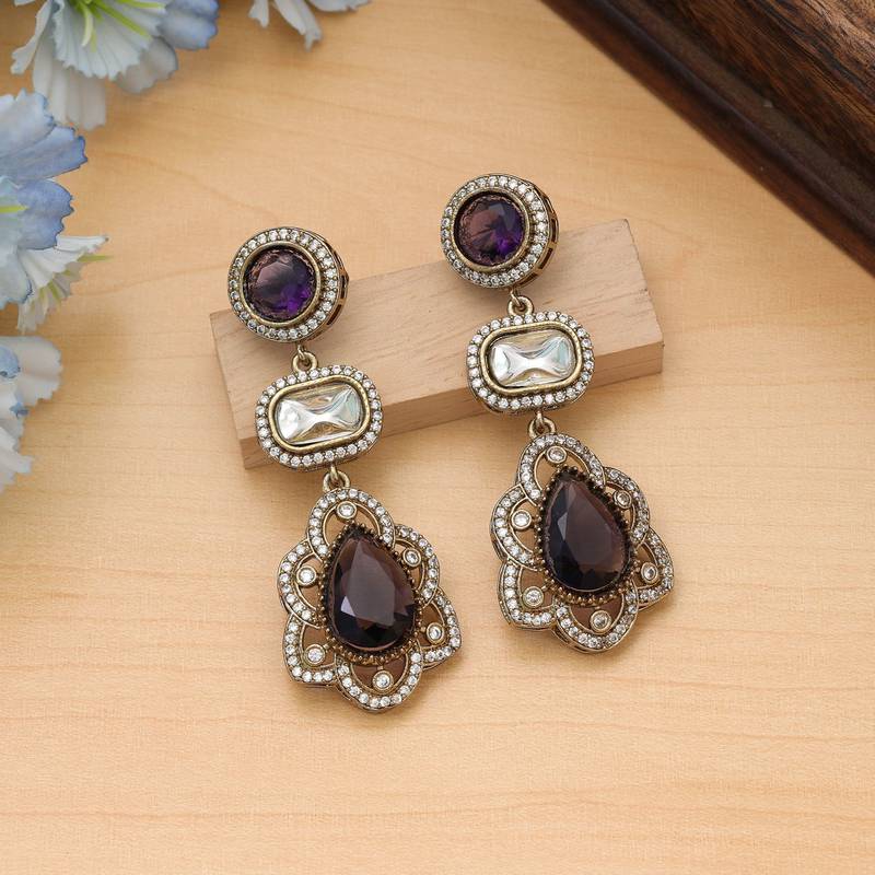 Purple color american diamond earrings