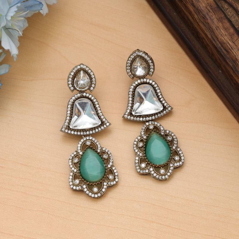 Pista green color american diamond earrings