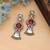 Red color american diamond earrings
