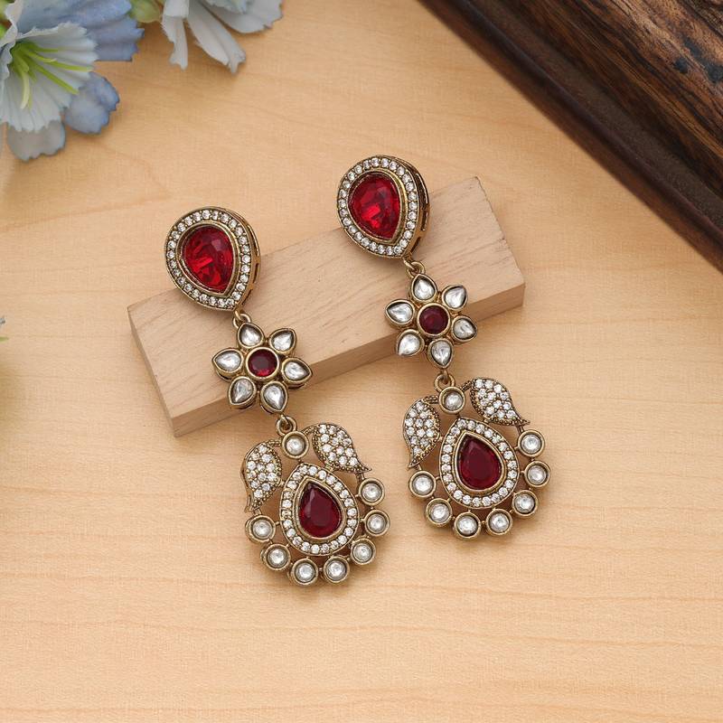Red color american diamond earrings