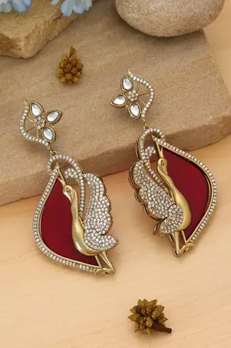 Red color american diamond earrings