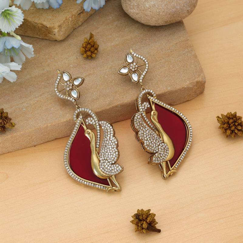 Red color american diamond earrings