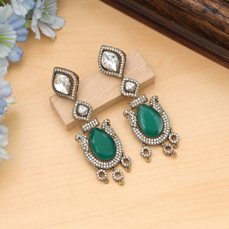 Green color american diamond earrings