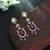 Purple color american diamond earrings