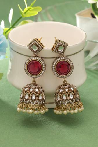 Red color american diamond earrings