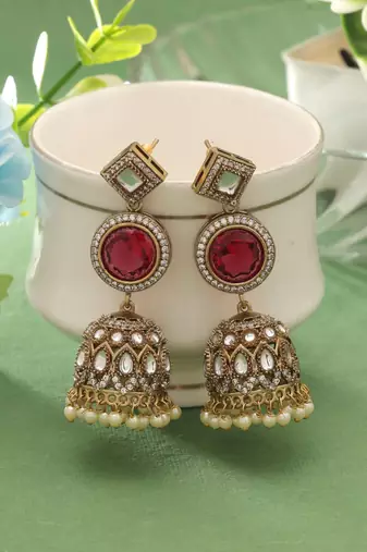Red color american diamond earrings