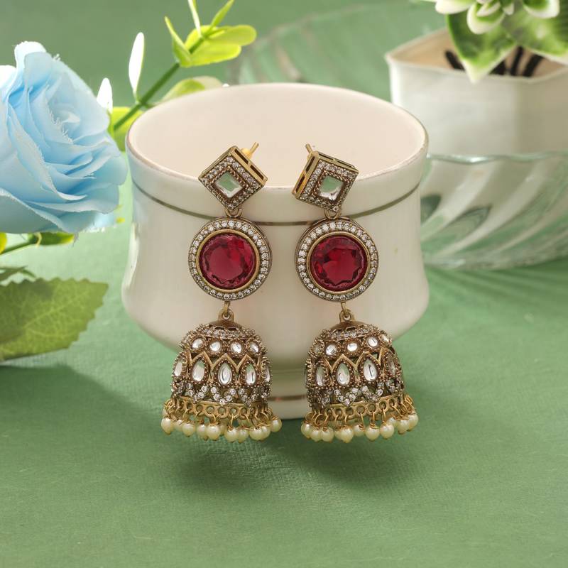 Red color american diamond earrings