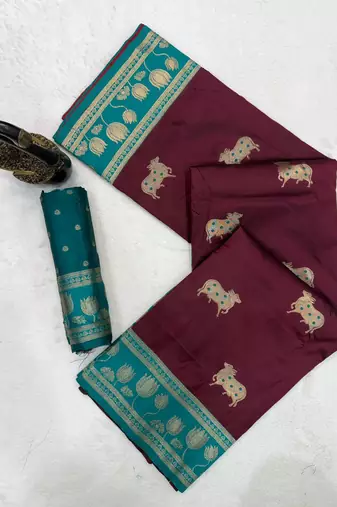 maroon soft art silk saree with teal dual zari border