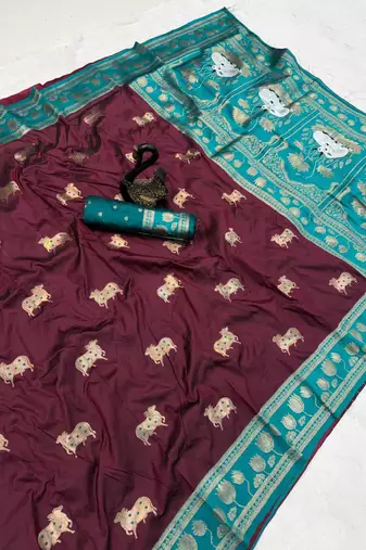 maroon soft art silk saree with teal dual zari border