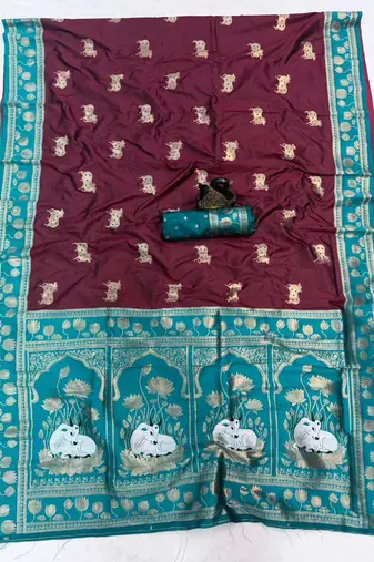maroon soft art silk saree with teal dual zari border