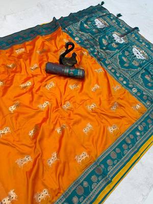 orange soft art silk saree with teal dual zari border 3