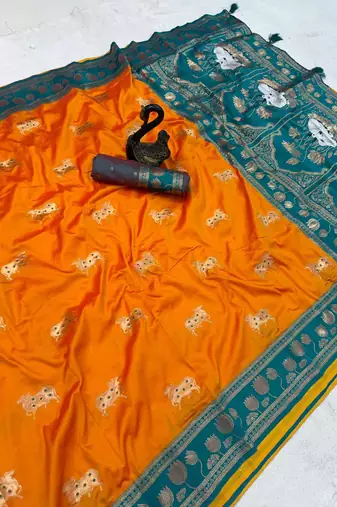 orange soft art silk saree with teal dual zari border