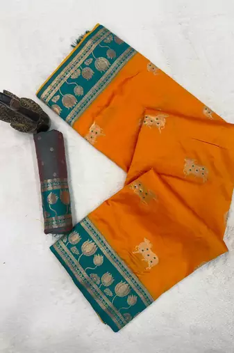 orange soft art silk saree with teal dual zari border