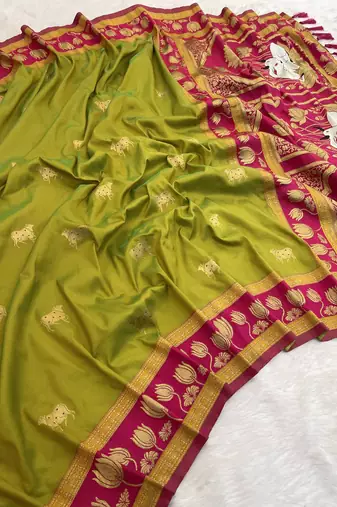 parrot green soft art silk saree with pink zari border
