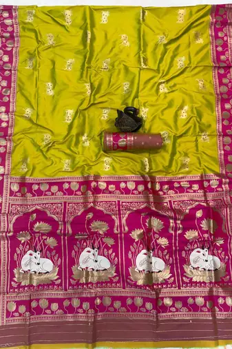 parrot green soft art silk saree with pink zari border