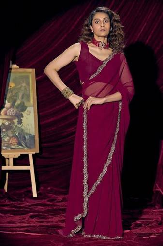 Wine color pure georgette zircon handwork border saree