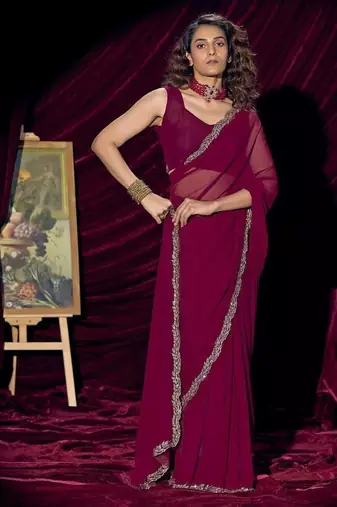 Wine color pure georgette zircon handwork border saree