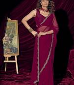 Wine color pure georgette zircon handwork border saree