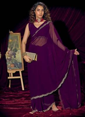 Purple color pure georgette zircon handwork border saree 1
