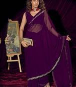 Purple color pure georgette zircon handwork border saree