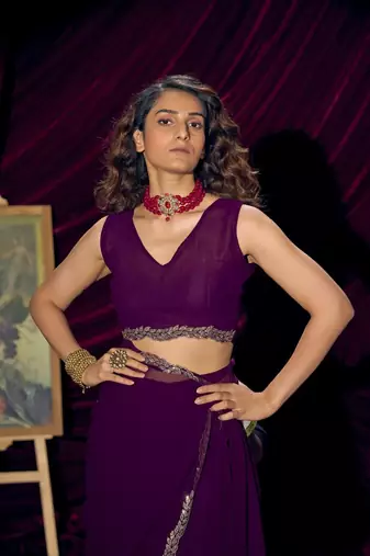 Purple color pure georgette zircon handwork border saree