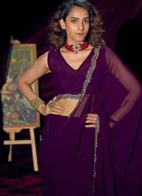Purple color pure georgette zircon handwork border saree 5